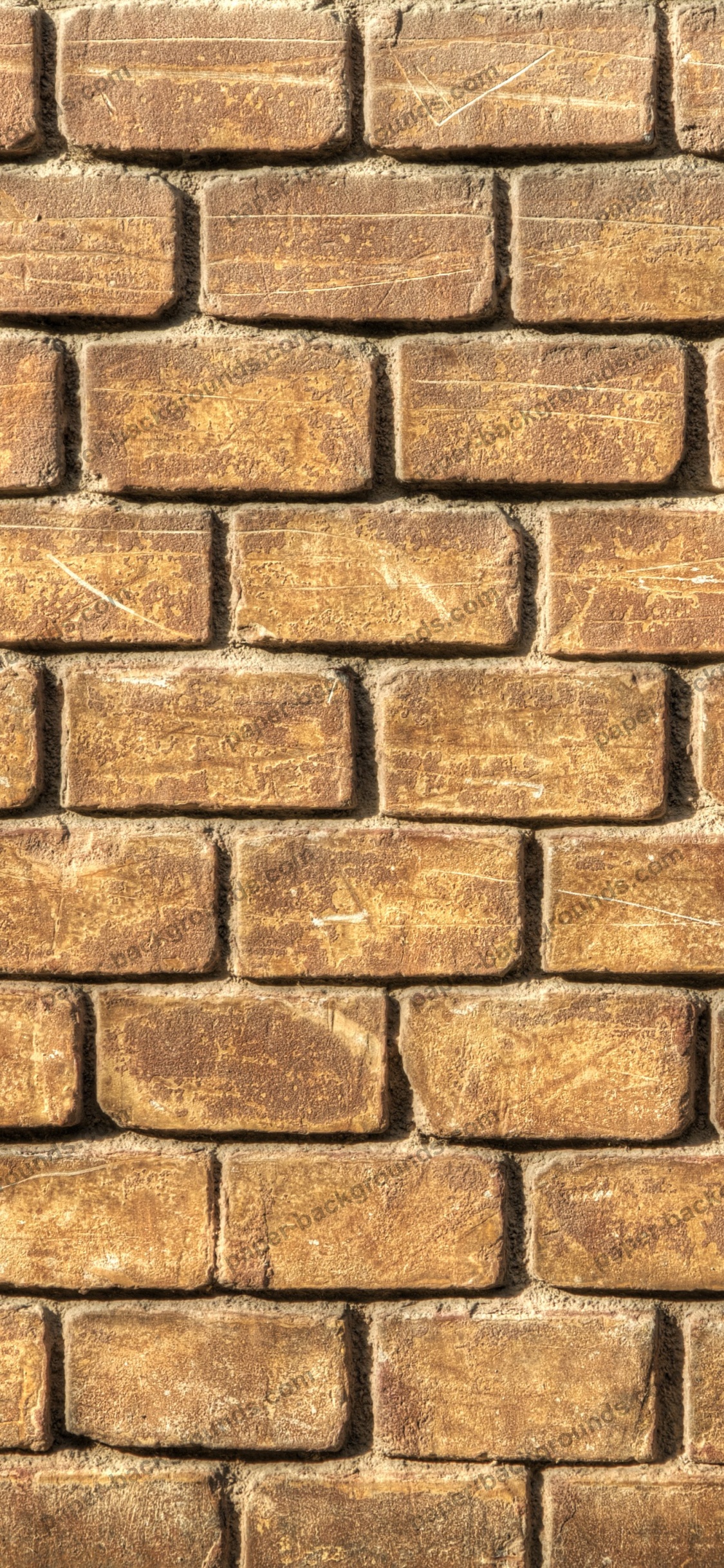 Mur de Briques Brunes et Noires. Wallpaper in 1125x2436 Resolution