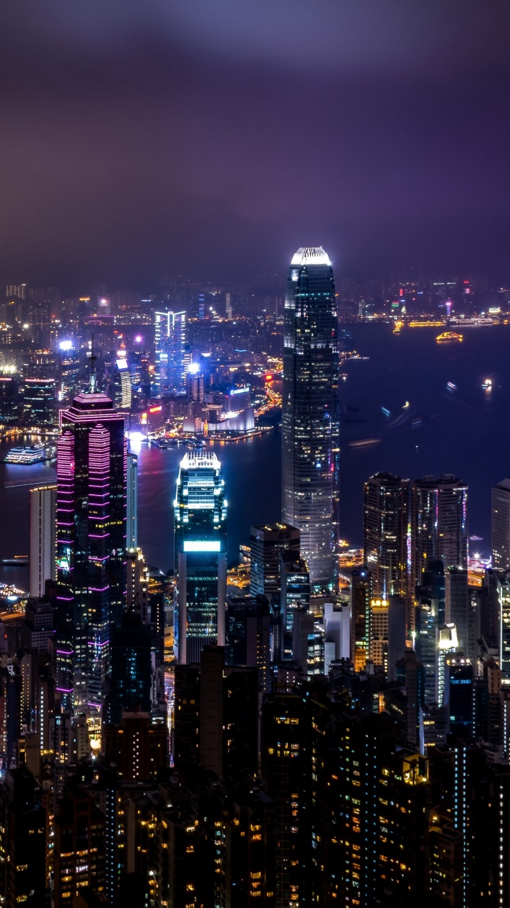 City Skyline During Night Time. Wallpaper in 720x1280 Resolution