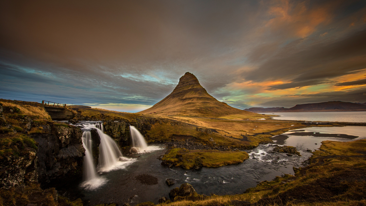 Waterfalls Near Brown Mountain Under White Clouds During Daytime. Wallpaper in 1280x720 Resolution