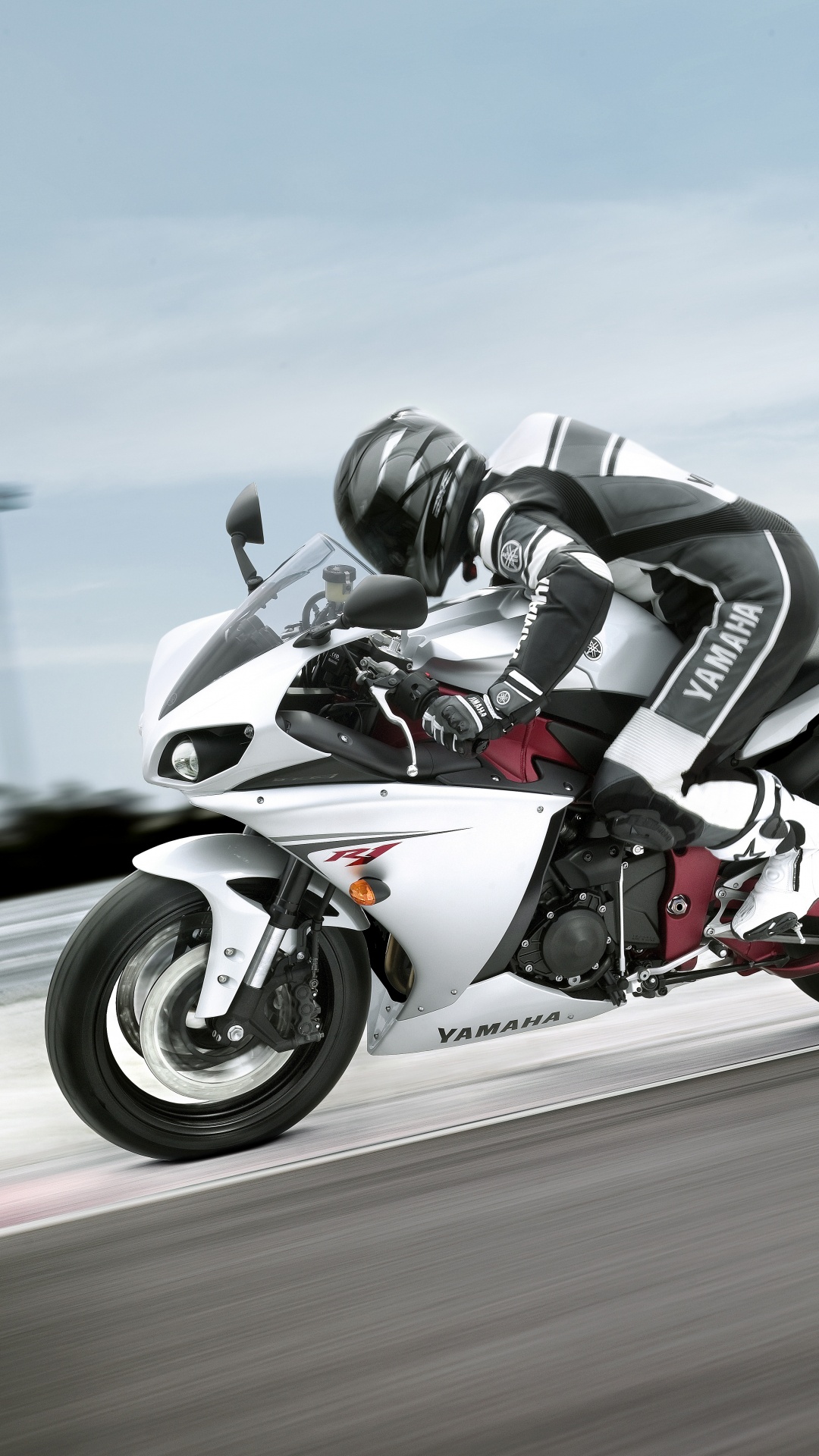 Man Riding White Sports Bike on Road During Daytime. Wallpaper in 1080x1920 Resolution