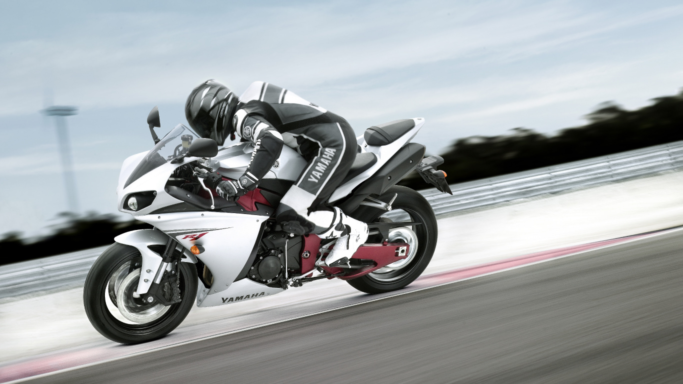Man Riding White Sports Bike on Road During Daytime. Wallpaper in 1366x768 Resolution