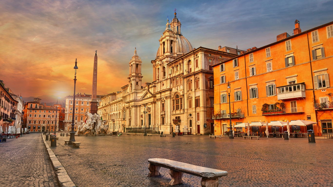 La Gente Caminando en la Acera Cerca Del Edificio de Hormigón Marrón Durante el Día. Wallpaper in 1366x768 Resolution