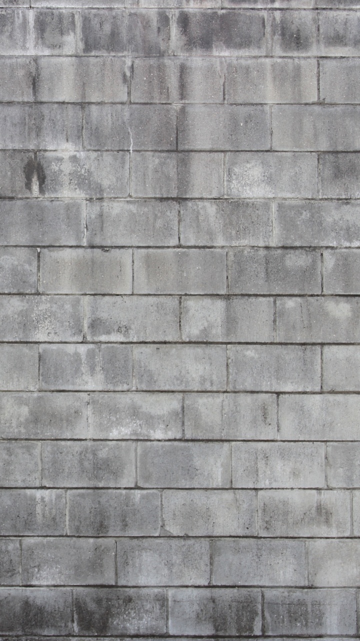 Pared de Ladrillo Gris Durante el Día. Wallpaper in 720x1280 Resolution