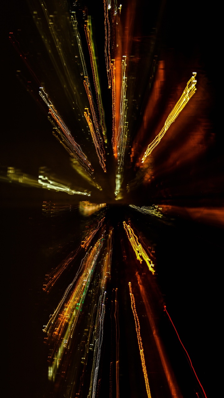 Gelbes Und Weißes Feuerwerk Während Der Nacht. Wallpaper in 720x1280 Resolution