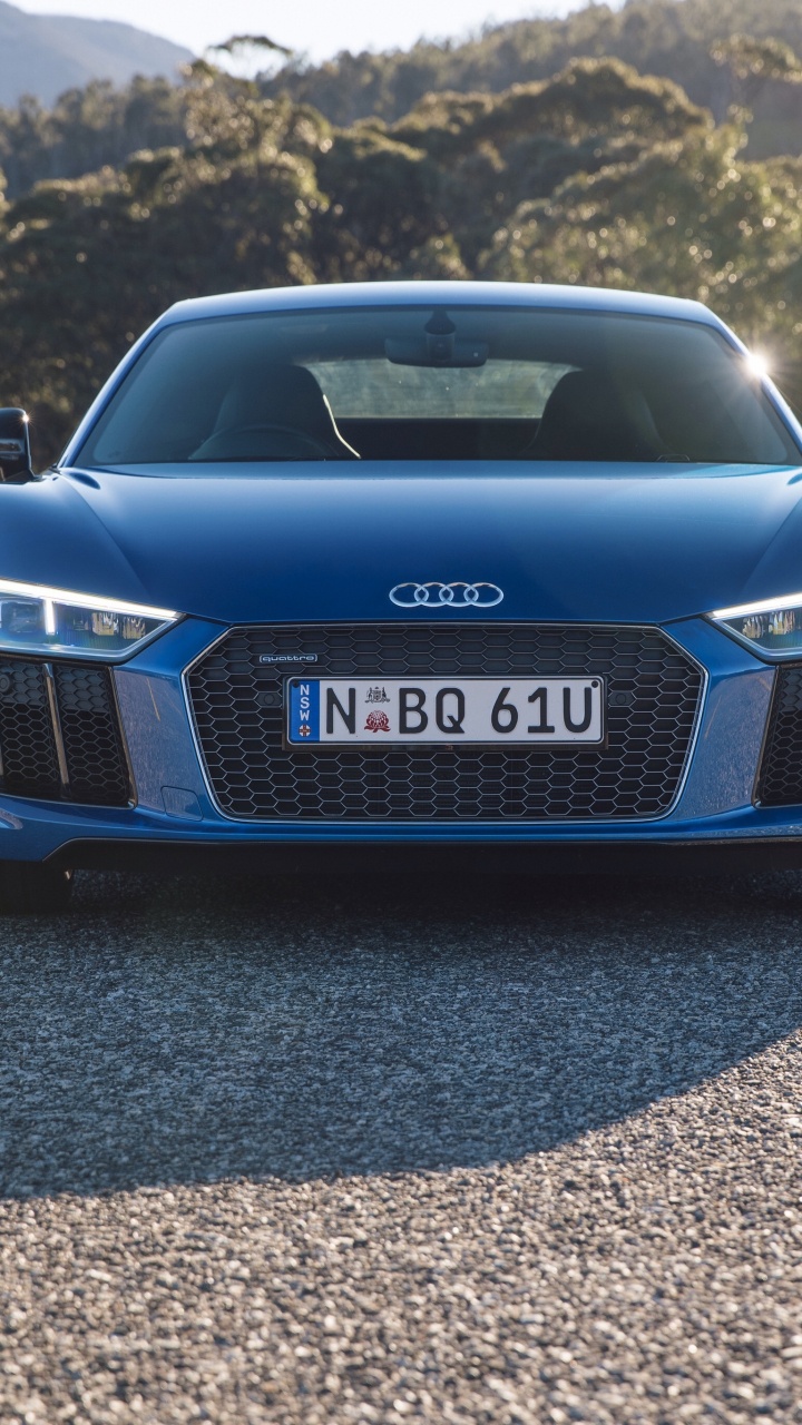 Bleu Audi a 4 Sur Route Pendant la Journée. Wallpaper in 720x1280 Resolution