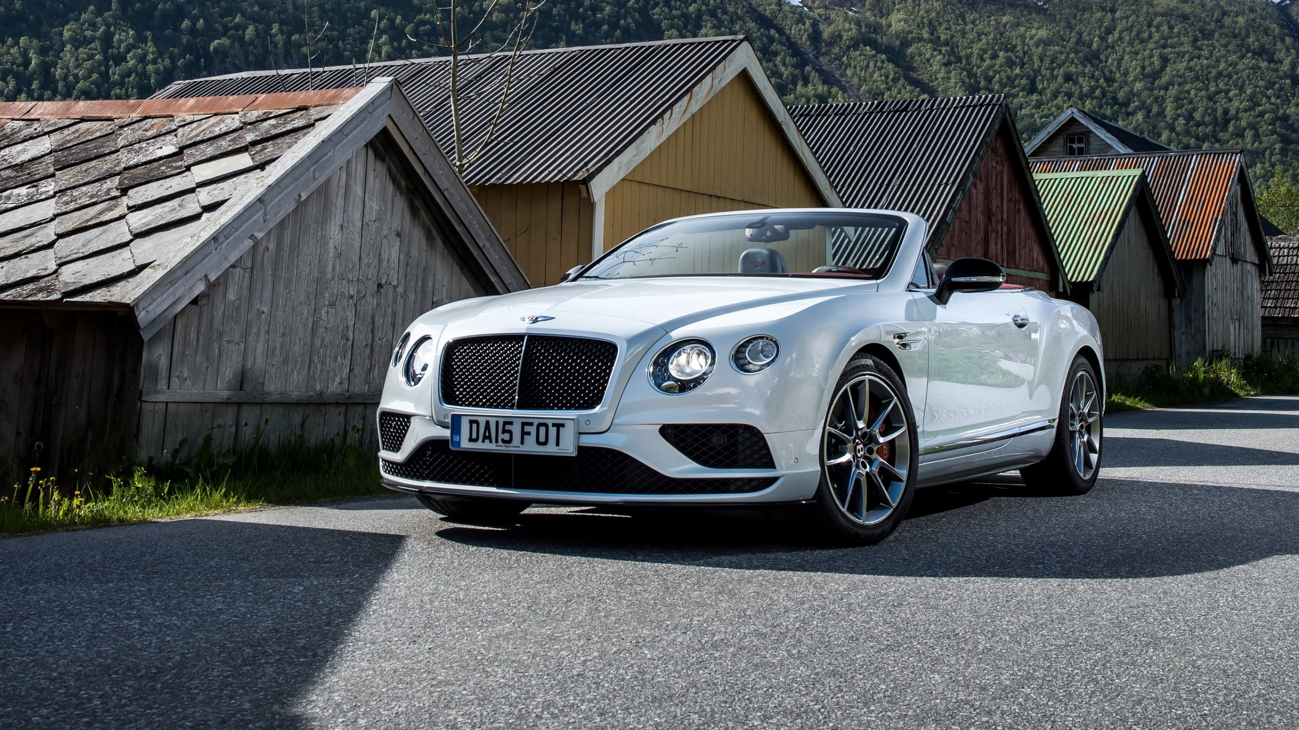 White Mercedes Benz Coupe Parked Beside Brown Wooden House During Daytime. Wallpaper in 2560x1440 Resolution
