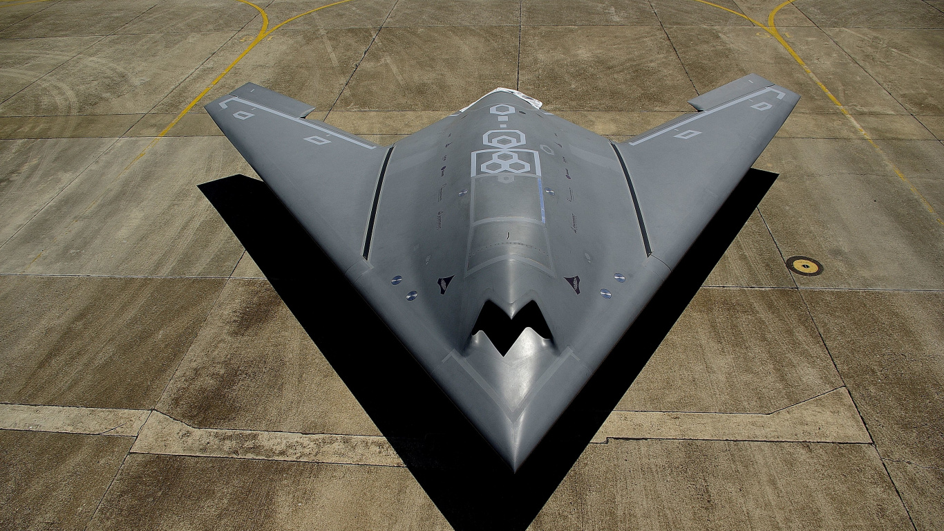 Black Jet Plane on Brown Field During Daytime. Wallpaper in 1366x768 Resolution