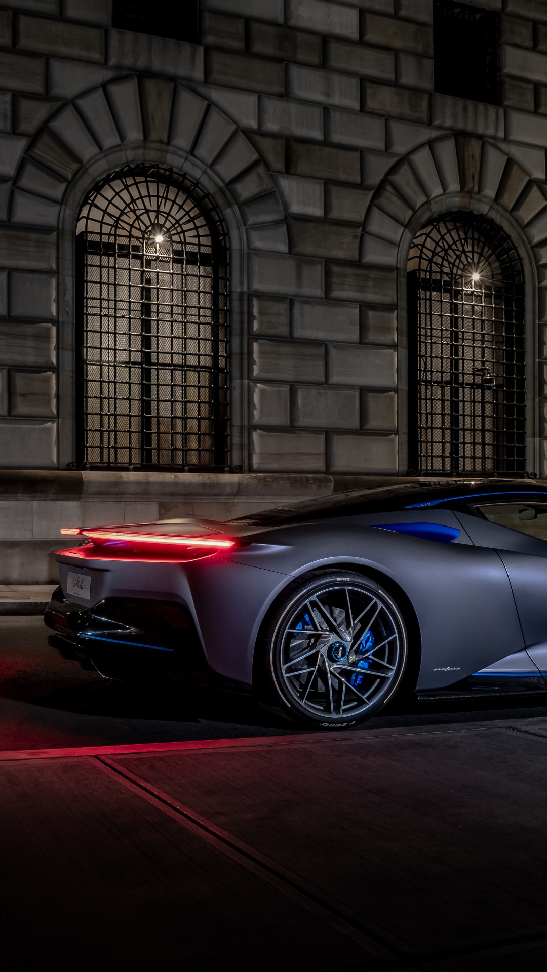 Blue Porsche 911 Parked in Front of Building. Wallpaper in 1080x1920 Resolution