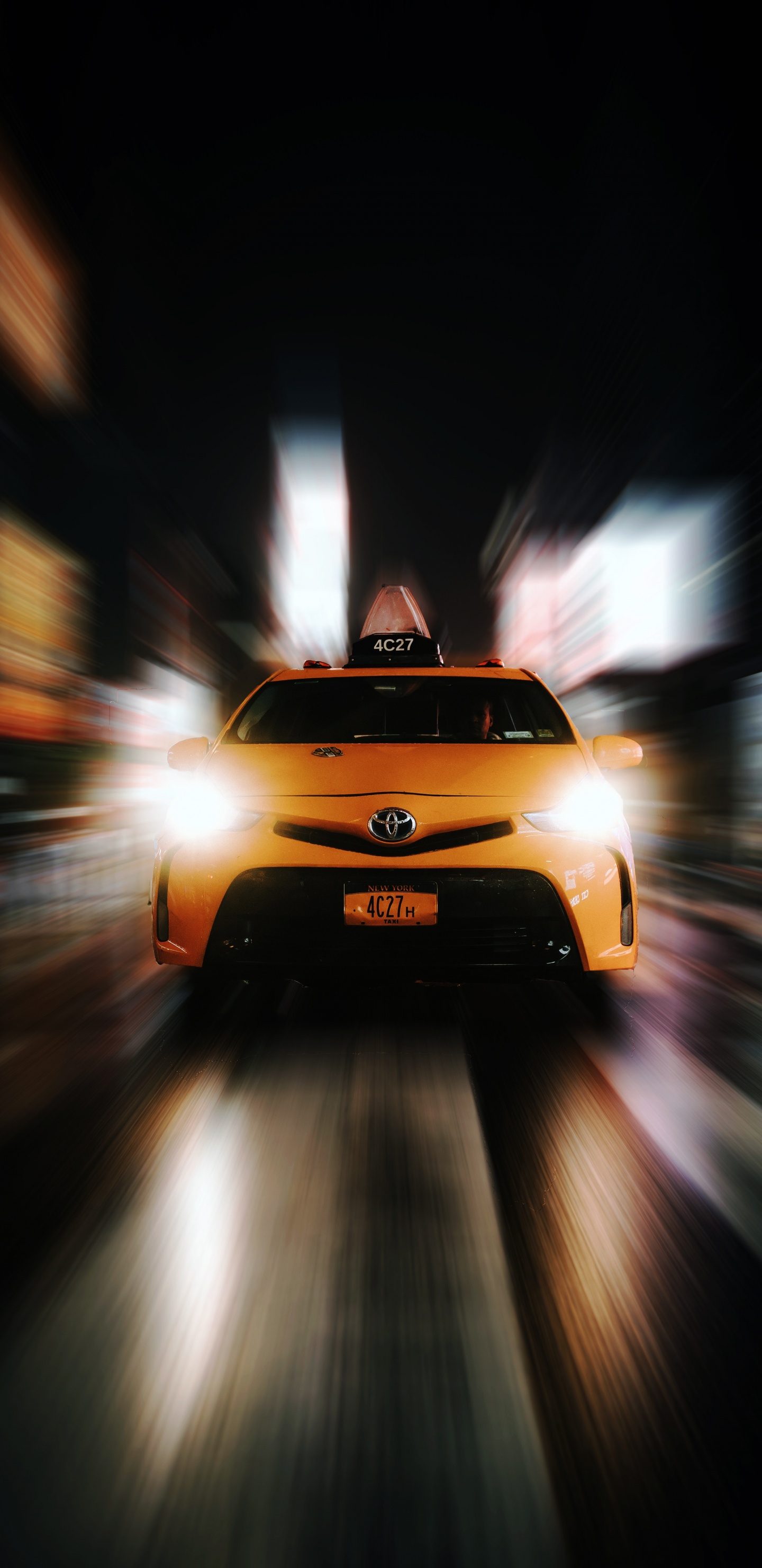 Yellow Car on Road During Night Time. Wallpaper in 1440x2960 Resolution