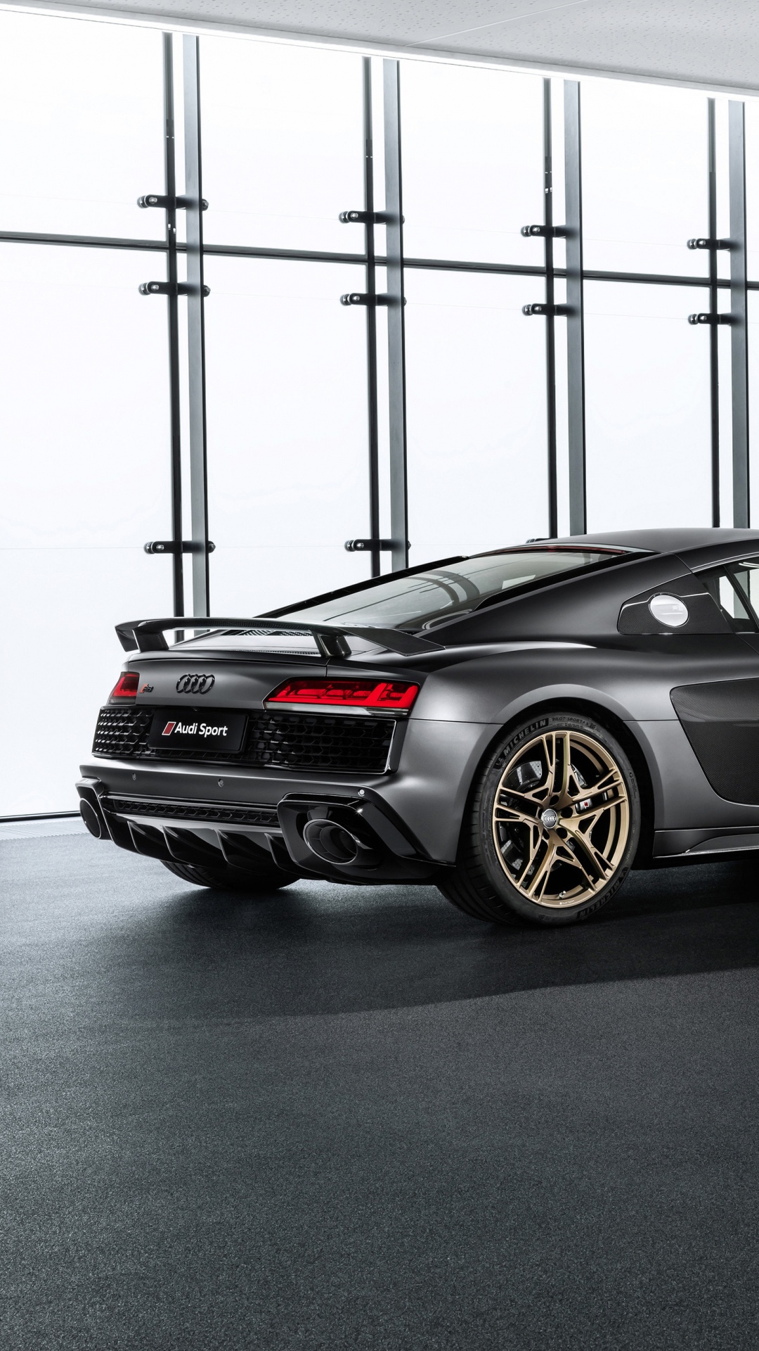 Black Porsche 911 Parked in a Room. Wallpaper in 1080x1920 Resolution