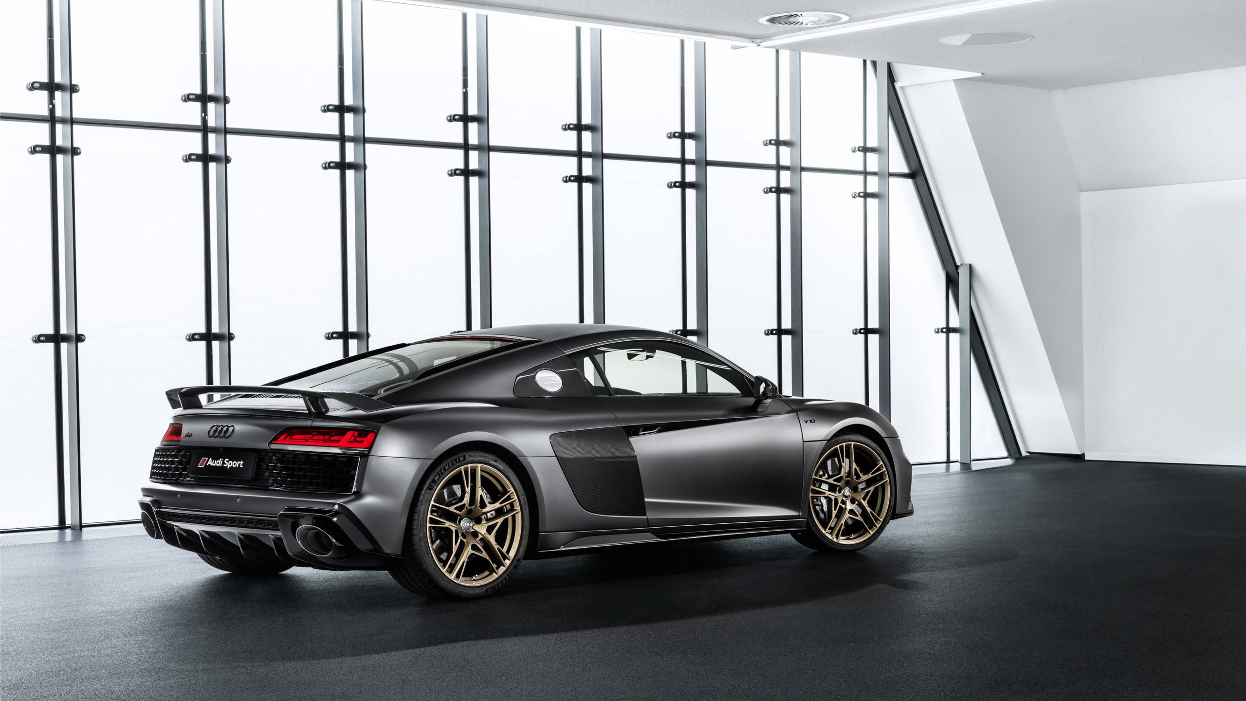 Black Porsche 911 Parked in a Room. Wallpaper in 2560x1440 Resolution