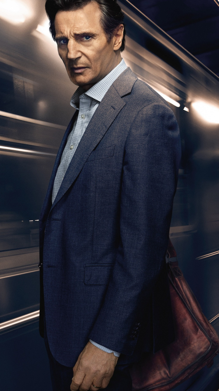 Man in Black Suit Standing on Train Station. Wallpaper in 750x1334 Resolution