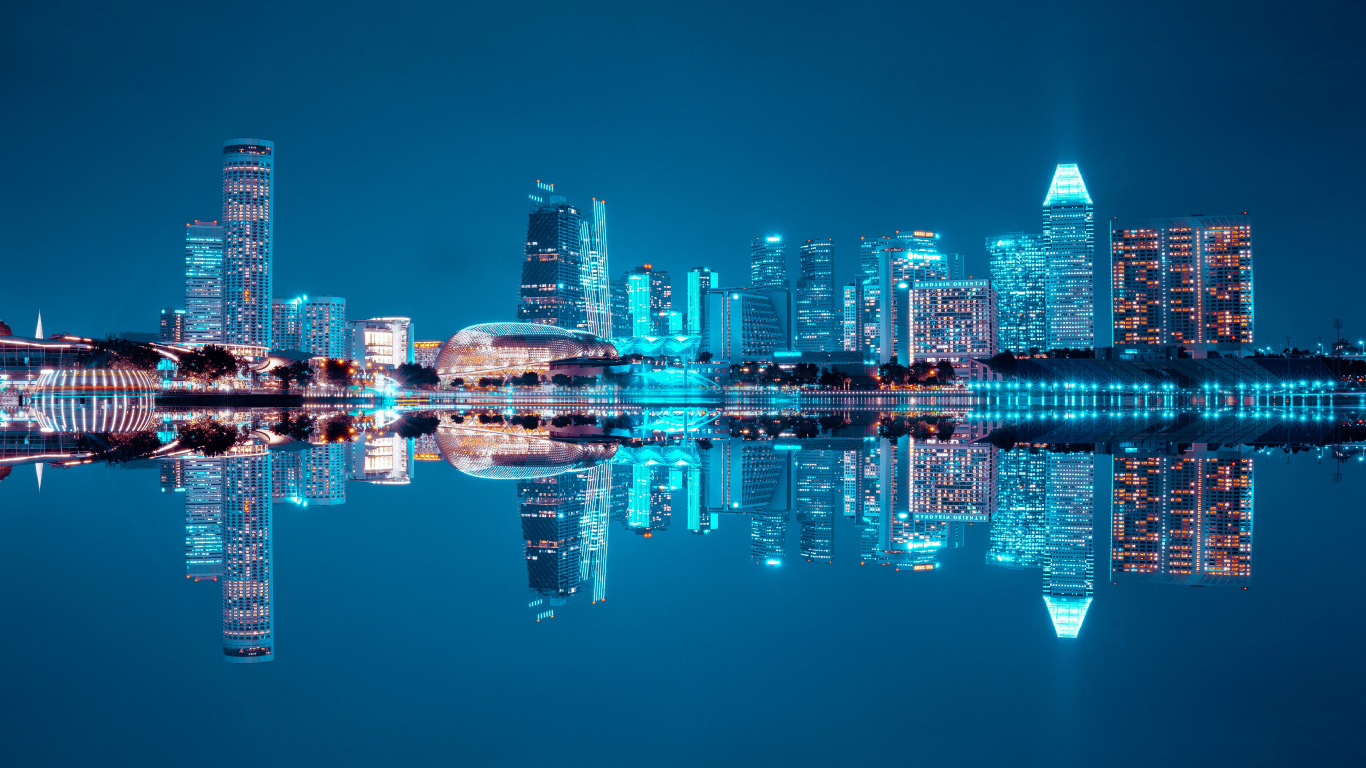 City Skyline Across Body of Water During Night Time. Wallpaper in 1366x768 Resolution