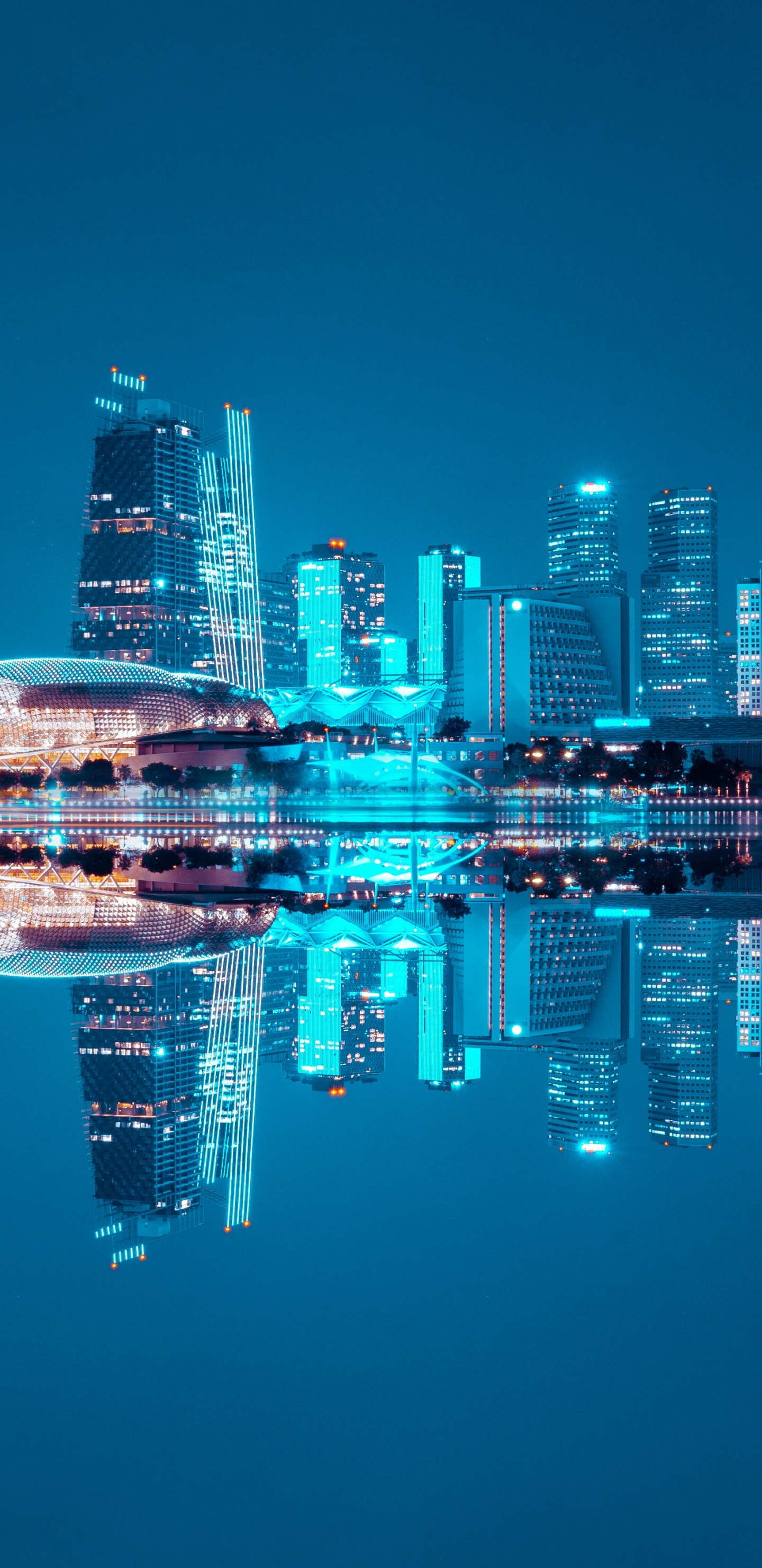 Horizon de la Ville à Travers le Plan D'eau Pendant la Nuit. Wallpaper in 1440x2960 Resolution