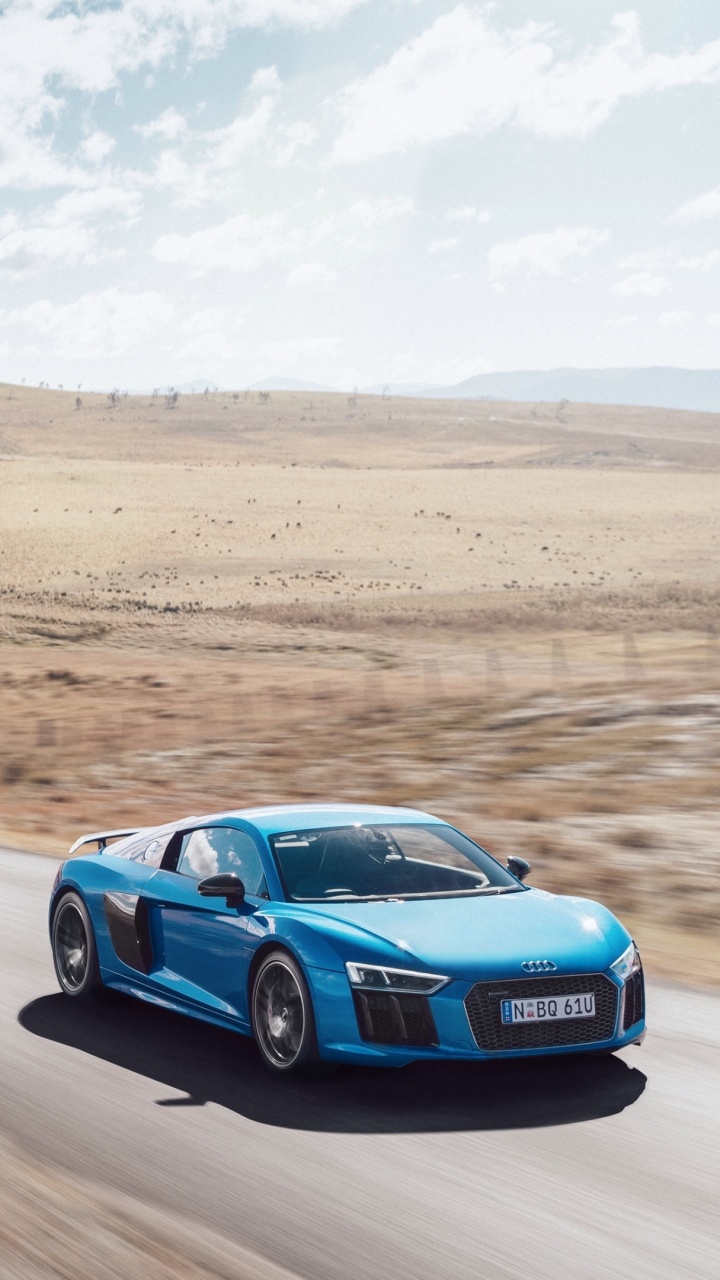 Coupé Audi Bleu Sur Route Pendant la Journée. Wallpaper in 720x1280 Resolution