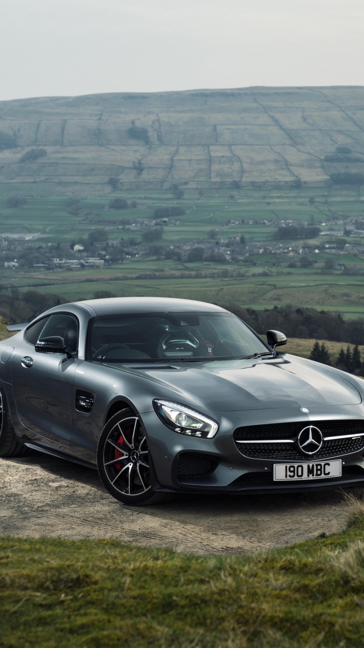 Black Mercedes Benz Coupe on Green Grass Field During Daytime. Wallpaper in 720x1280 Resolution