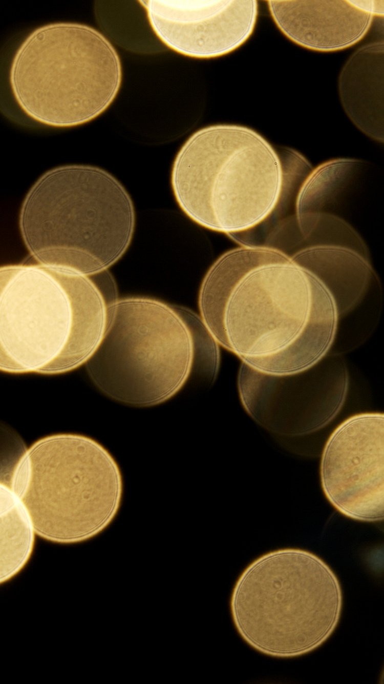 White and Yellow Polka Dot Lights. Wallpaper in 750x1334 Resolution