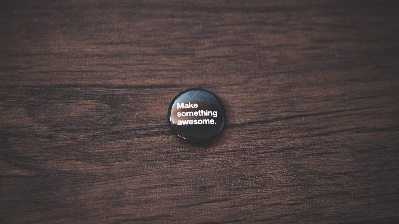 Black Round Plastic Lid on Brown Wooden Table. Wallpaper in 1280x720 Resolution