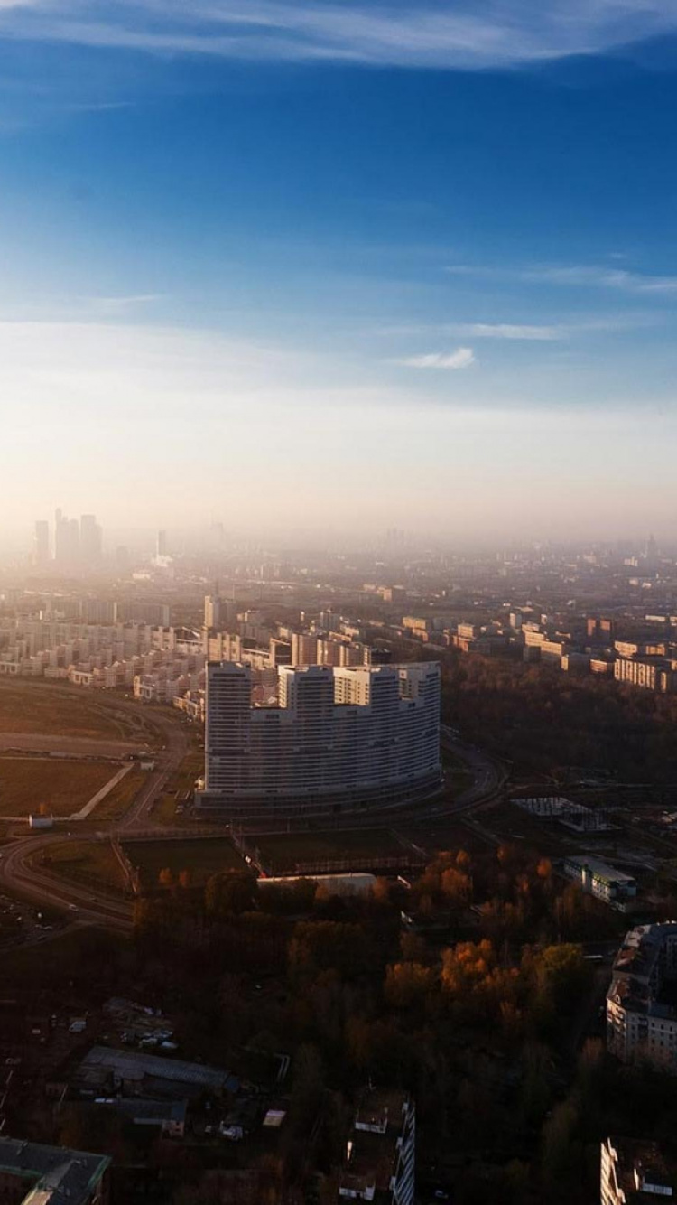 Vue Aérienne Des Bâtiments de la Ville Pendant la Journée. Wallpaper in 750x1334 Resolution