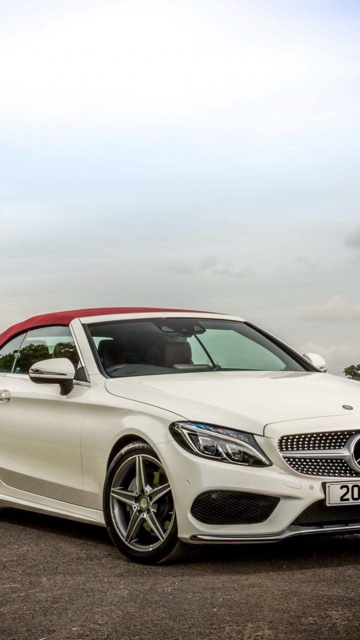 White Mercedes Benz Coupe on Road During Daytime. Wallpaper in 720x1280 Resolution