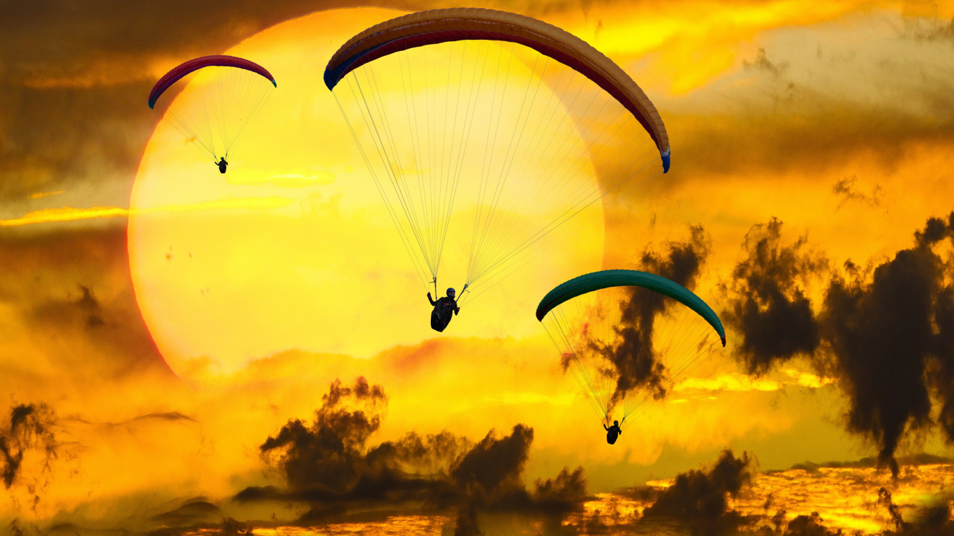 Silhouette of Person Riding Parachute During Sunset. Wallpaper in 1366x768 Resolution