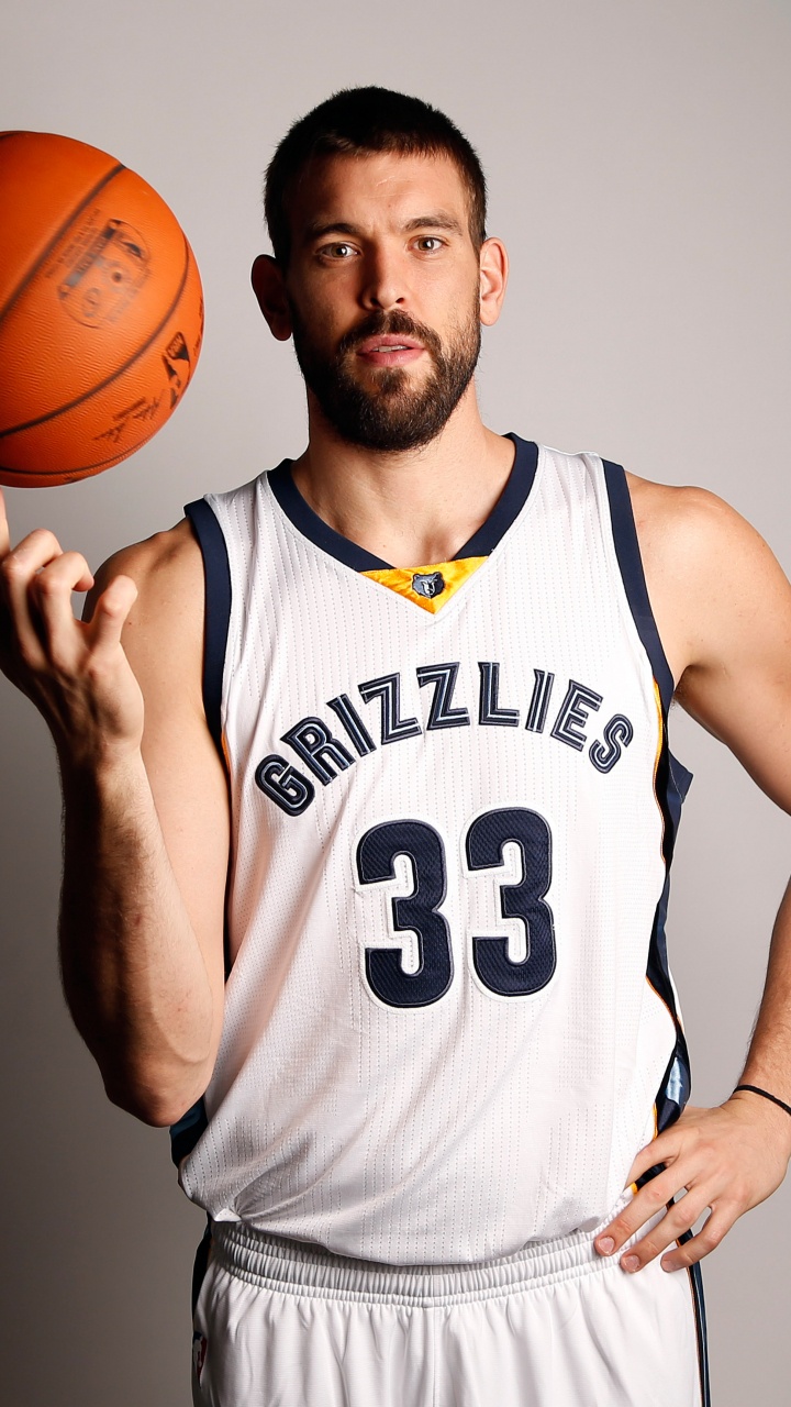 Man in White and Black Tank Top Holding Basketball. Wallpaper in 720x1280 Resolution