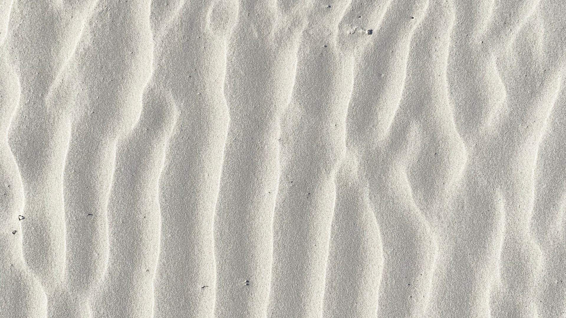 Brown Sand With Footprints During Daytime. Wallpaper in 1920x1080 Resolution