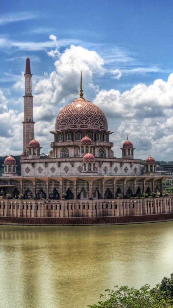 Brown and White Dome Building Near Body of Water Under Blue Sky During Daytime. Wallpaper in 720x1280 Resolution