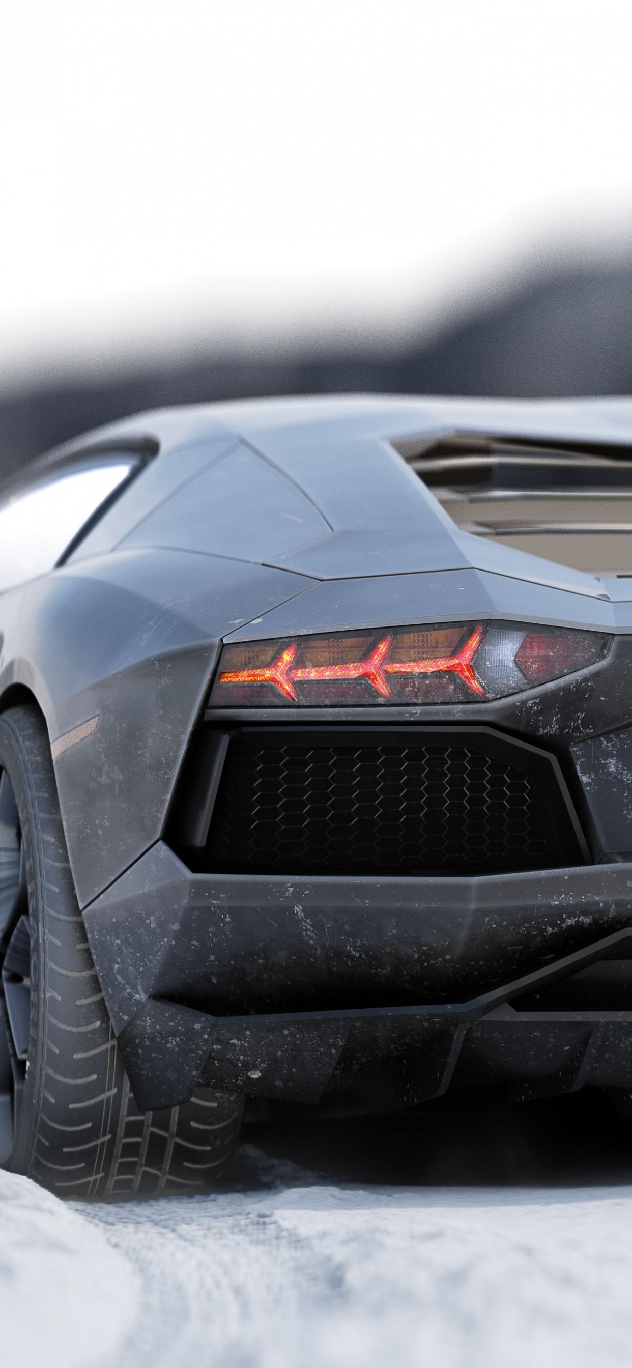 Schwarzer Lamborghini Aventador Auf Schneebedecktem Boden. Wallpaper in 1242x2688 Resolution