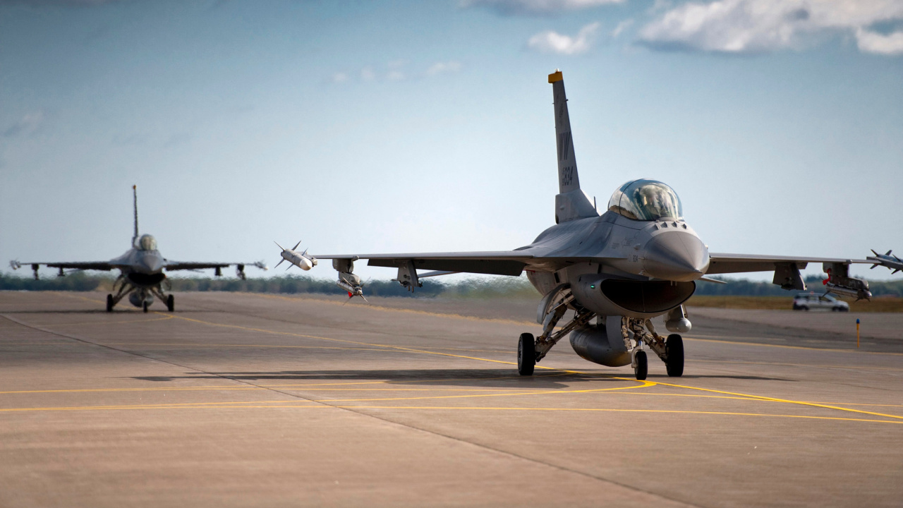 Gray Fighter Jet on Gray Concrete Ground Under Blue and White Sunny Cloudy Sky During Daytime. Wallpaper in 1280x720 Resolution
