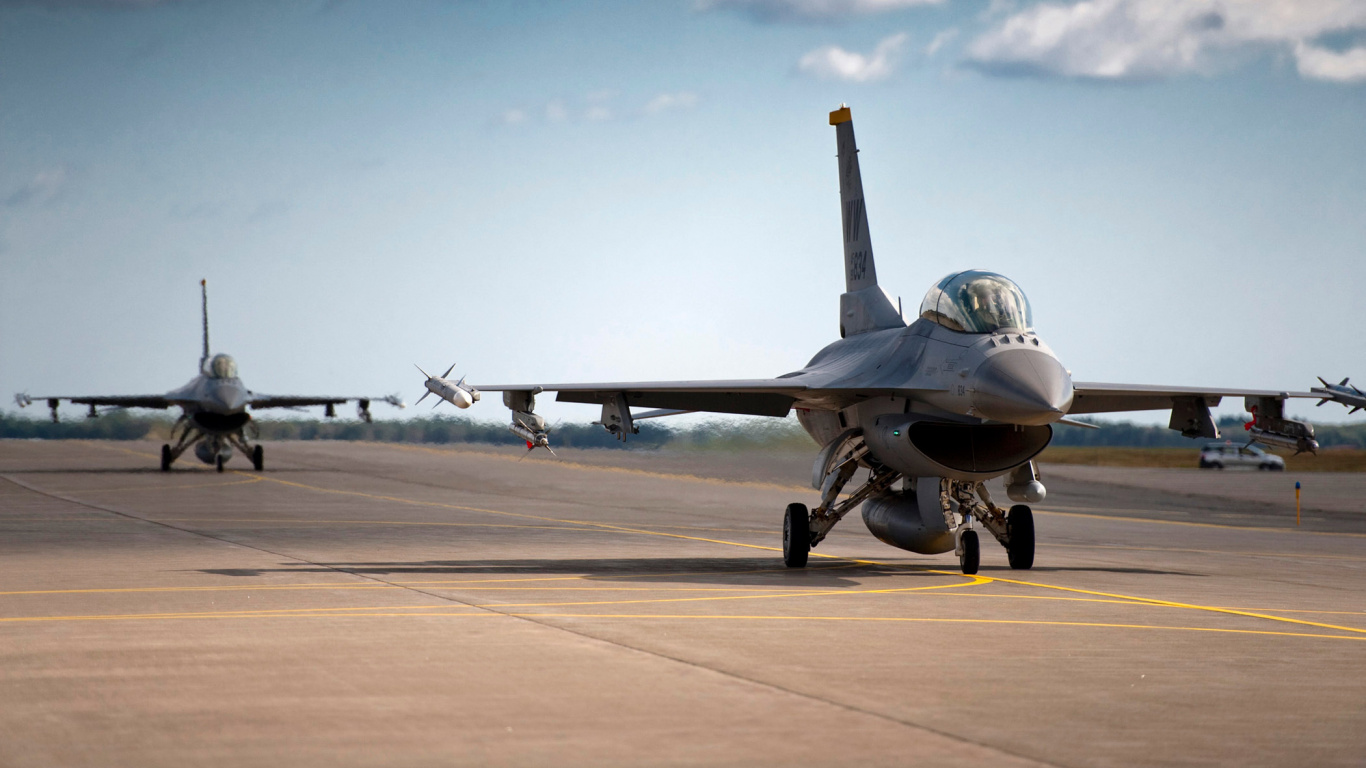 Gray Fighter Jet on Gray Concrete Ground Under Blue and White Sunny Cloudy Sky During Daytime. Wallpaper in 1366x768 Resolution