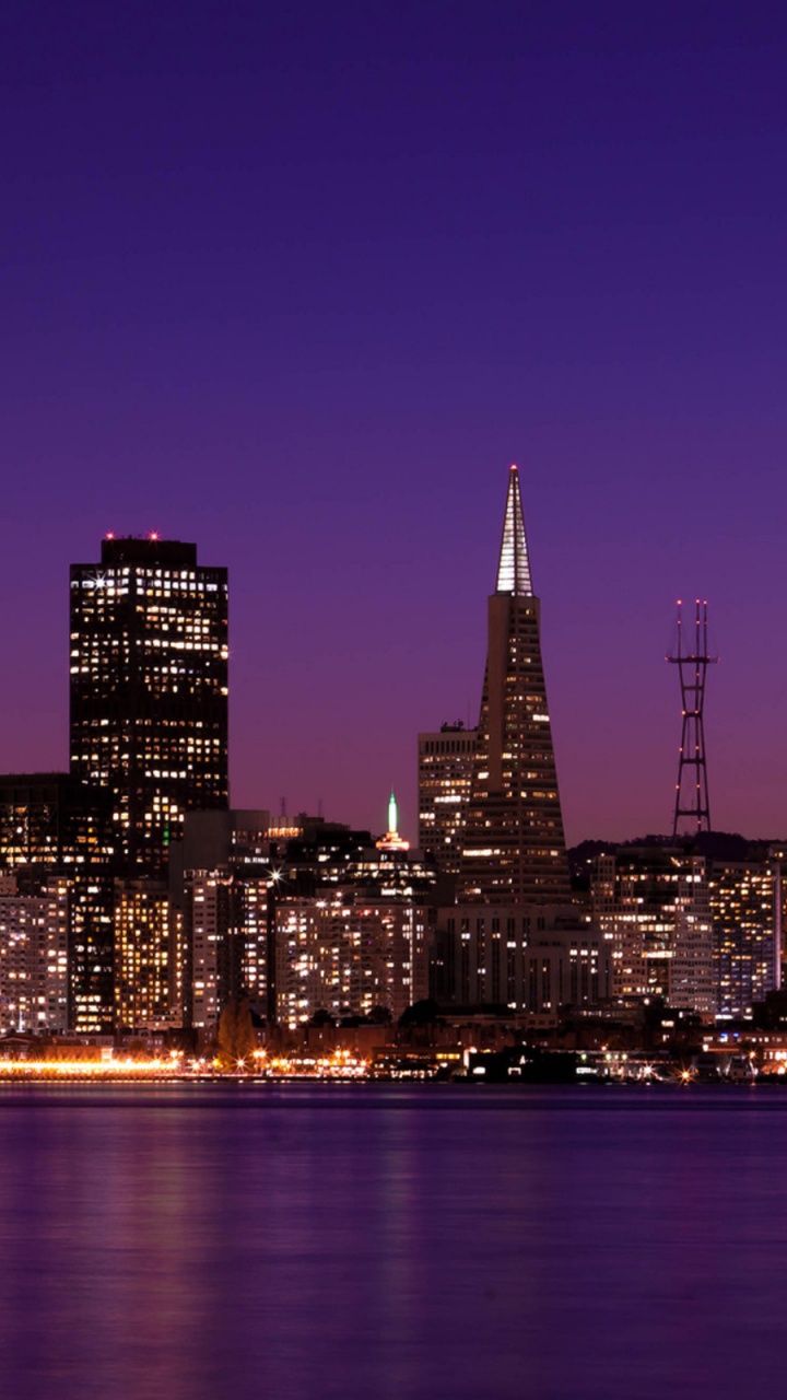 City Skyline During Night Time. Wallpaper in 720x1280 Resolution