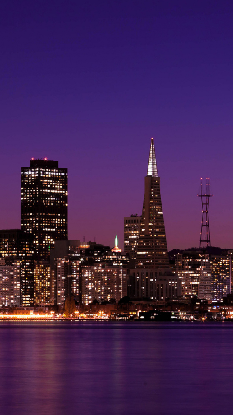 City Skyline During Night Time. Wallpaper in 750x1334 Resolution