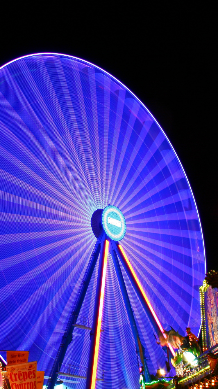 Blue and Red Ferris Wheel During Night Time. Wallpaper in 750x1334 Resolution