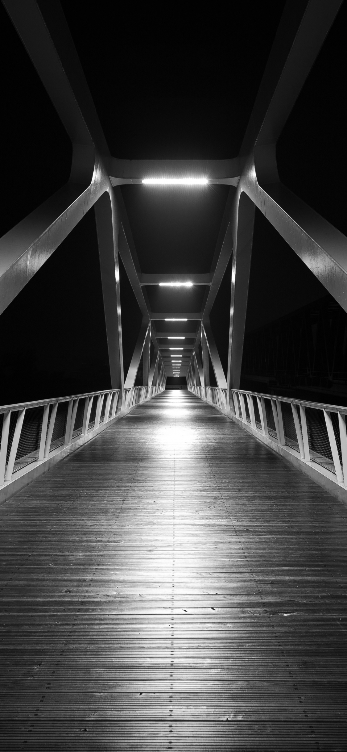 Grayscale Photo of a Bridge. Wallpaper in 1125x2436 Resolution