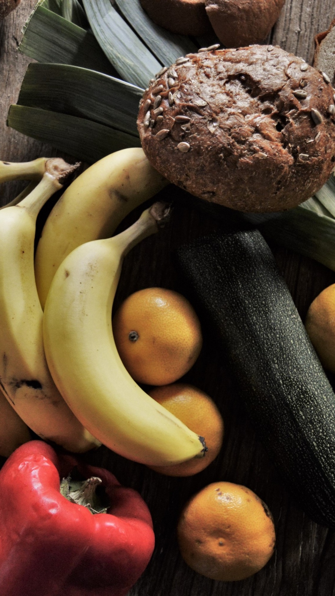 Yellow Banana Fruit Beside Red Apple Fruit. Wallpaper in 1080x1920 Resolution