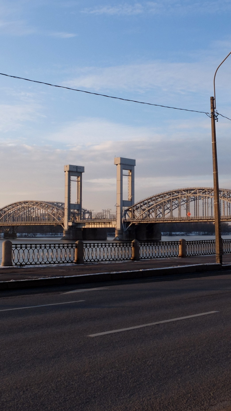 Bridge Over Body of Water During Daytime. Wallpaper in 750x1334 Resolution