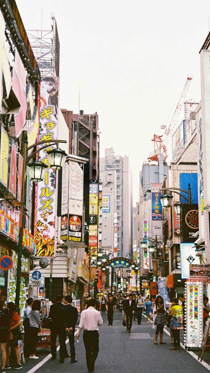 People Walking on Street During Daytime. Wallpaper in 720x1280 Resolution