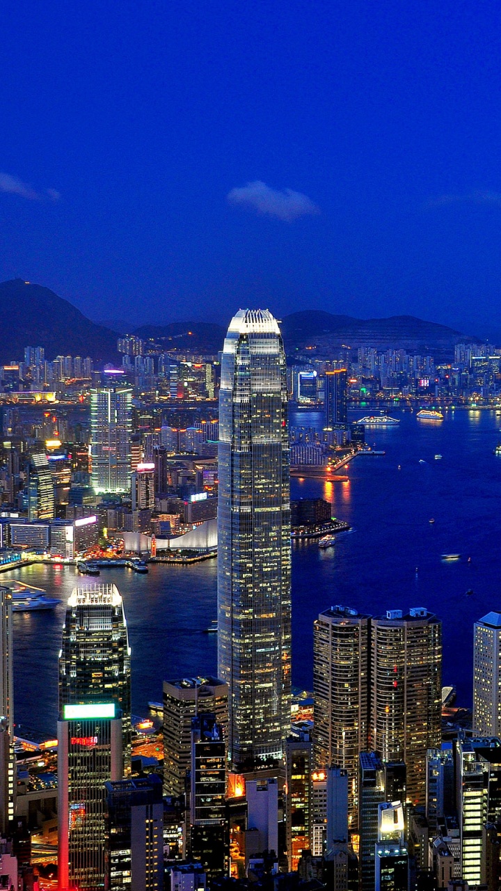 Horizonte de la Ciudad Durante la Noche. Wallpaper in 720x1280 Resolution