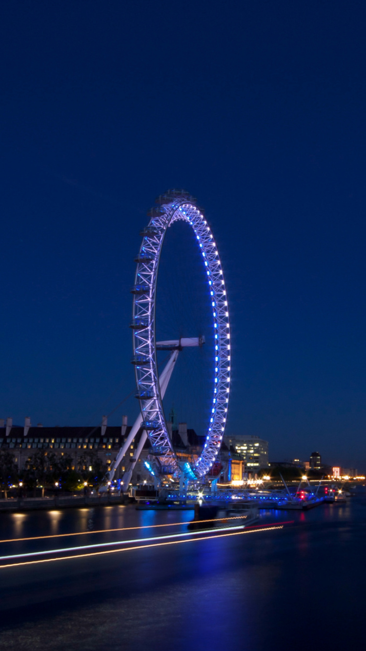 Ferris Wheel Near Body of Water During Night Time. Wallpaper in 750x1334 Resolution