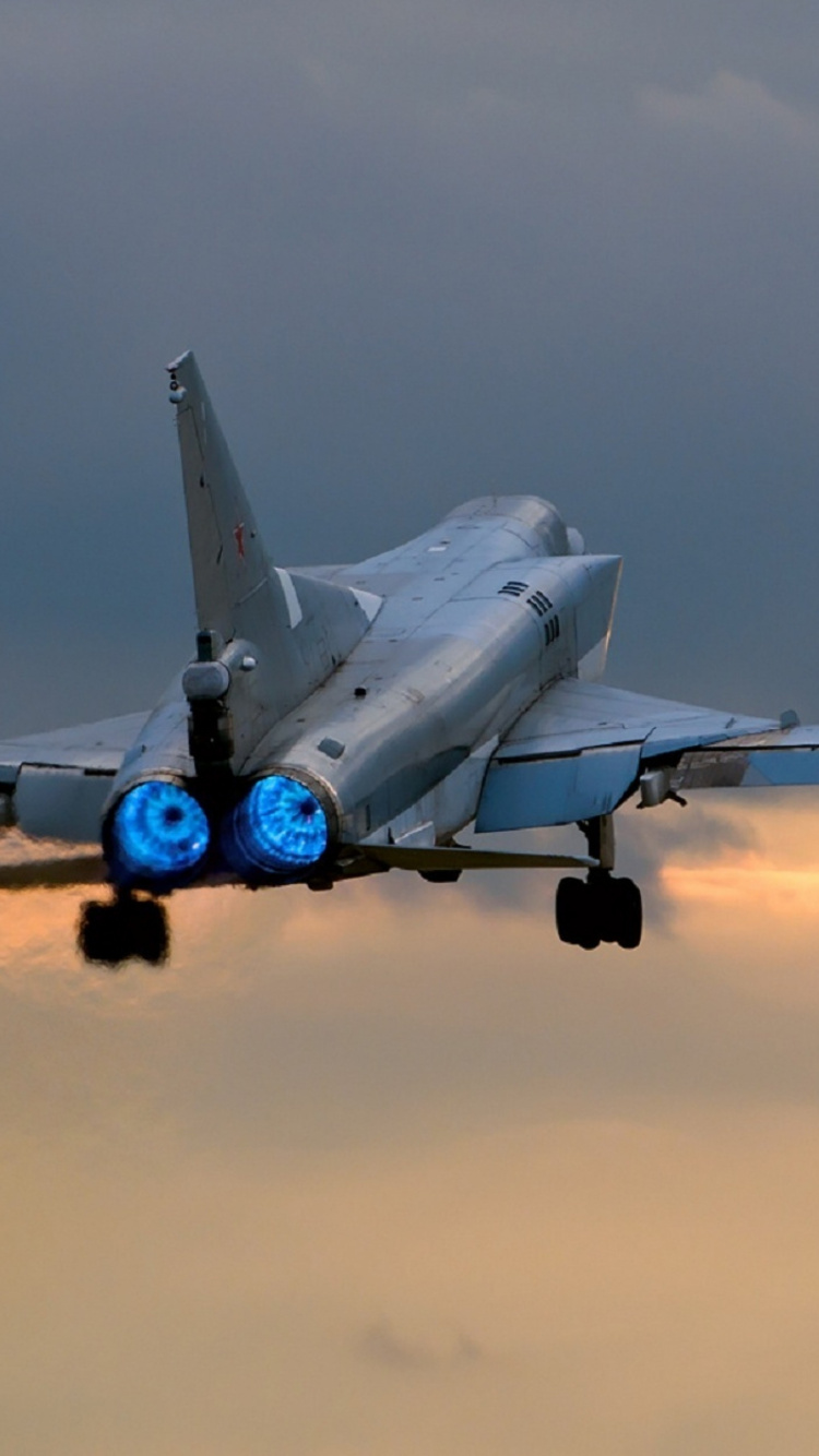 White and Blue Jet Plane Flying During Daytime. Wallpaper in 750x1334 Resolution
