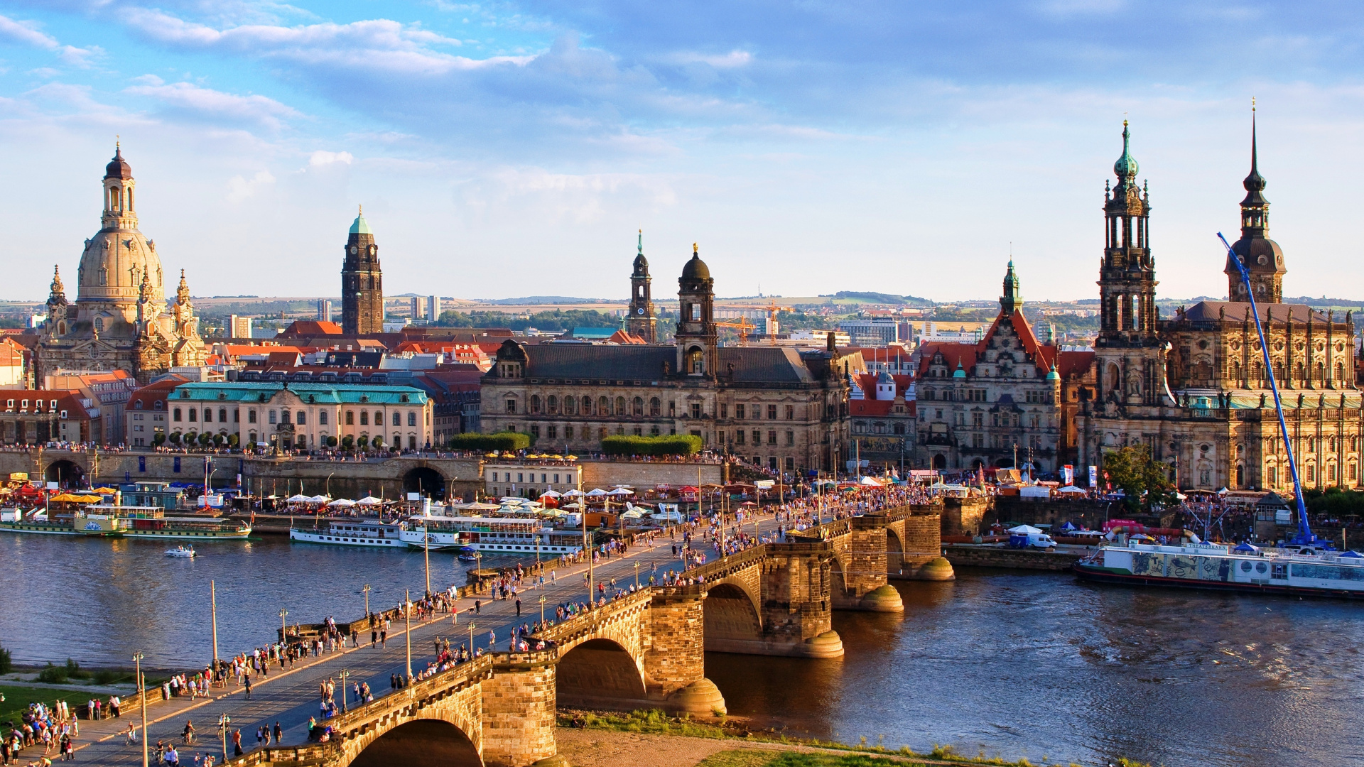 Brown Bridge Over River Near City Buildings During Daytime. Wallpaper in 1920x1080 Resolution