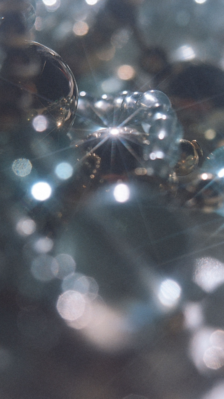 Blue and White Light Bokeh. Wallpaper in 750x1334 Resolution