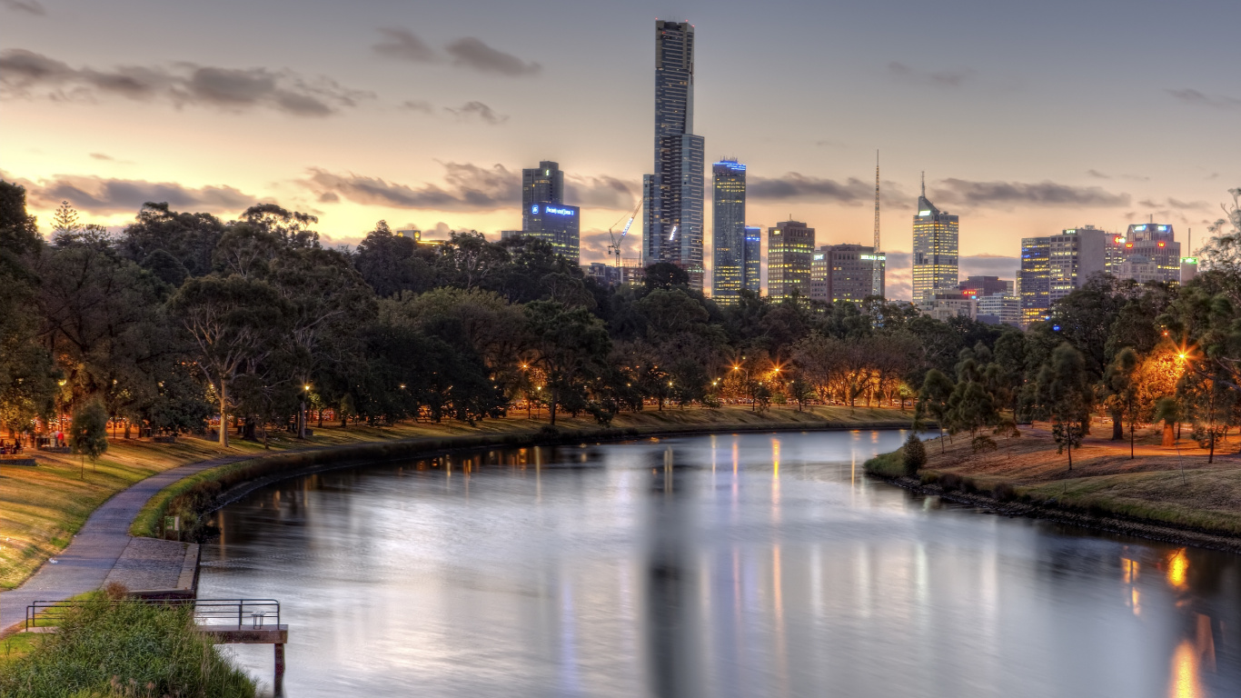 Body of Water Near Trees and Buildings During Daytime. Wallpaper in 1366x768 Resolution