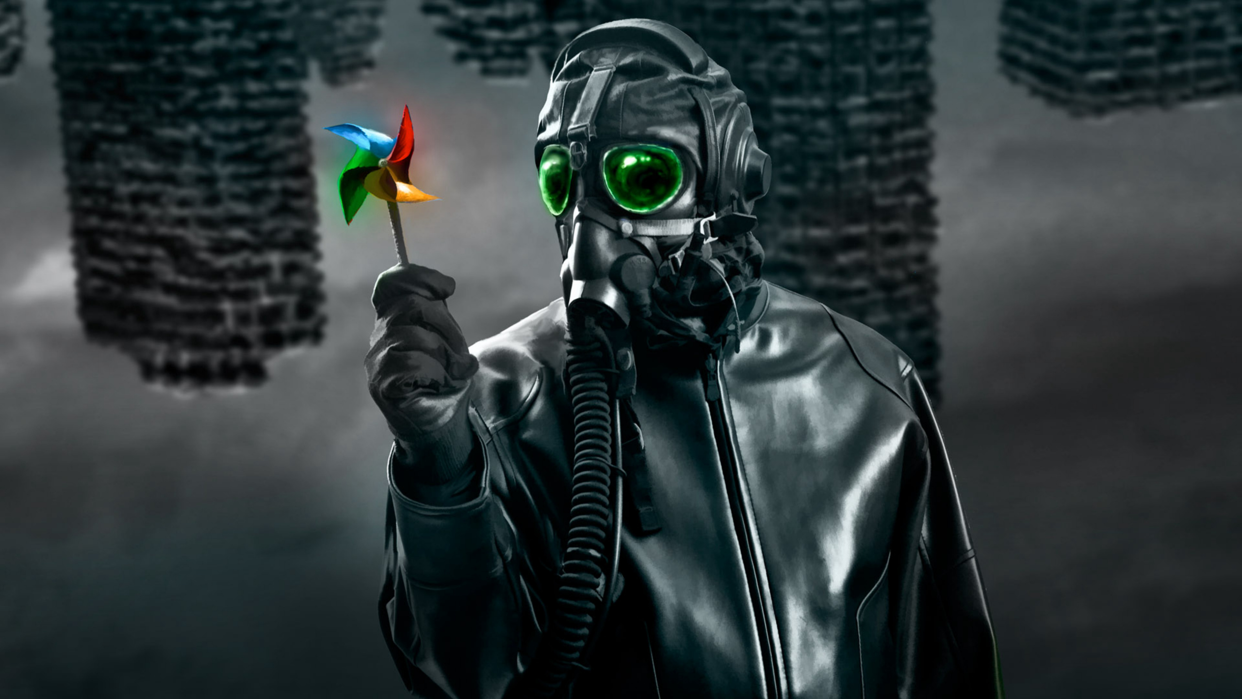 Person in Schwarzer Lederjacke Mit Grüner Maske Mit Gelber Und Oranger Blume. Wallpaper in 2560x1440 Resolution