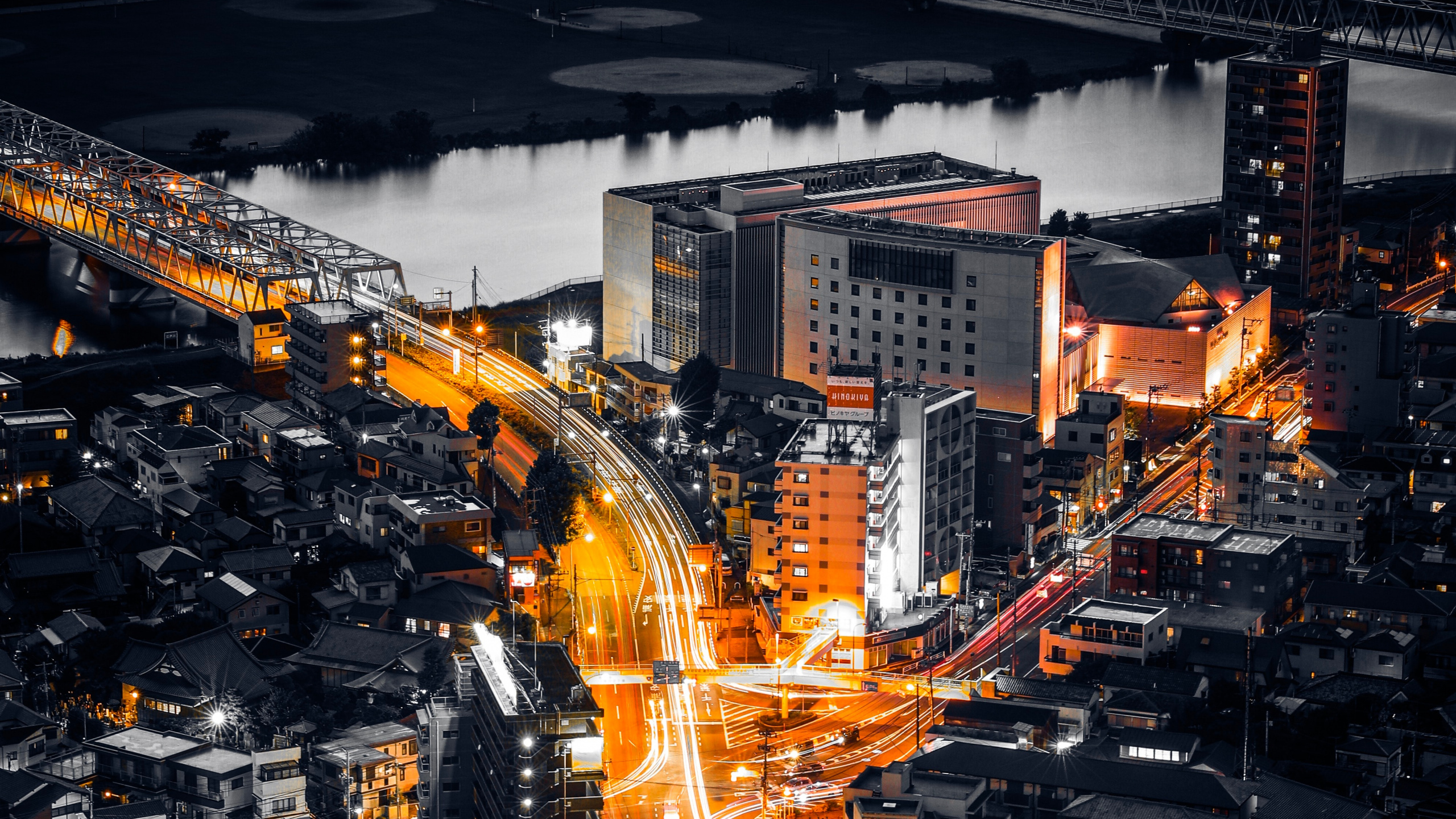 Vue Aérienne Des Bâtiments de la Ville Pendant la Nuit. Wallpaper in 2560x1440 Resolution