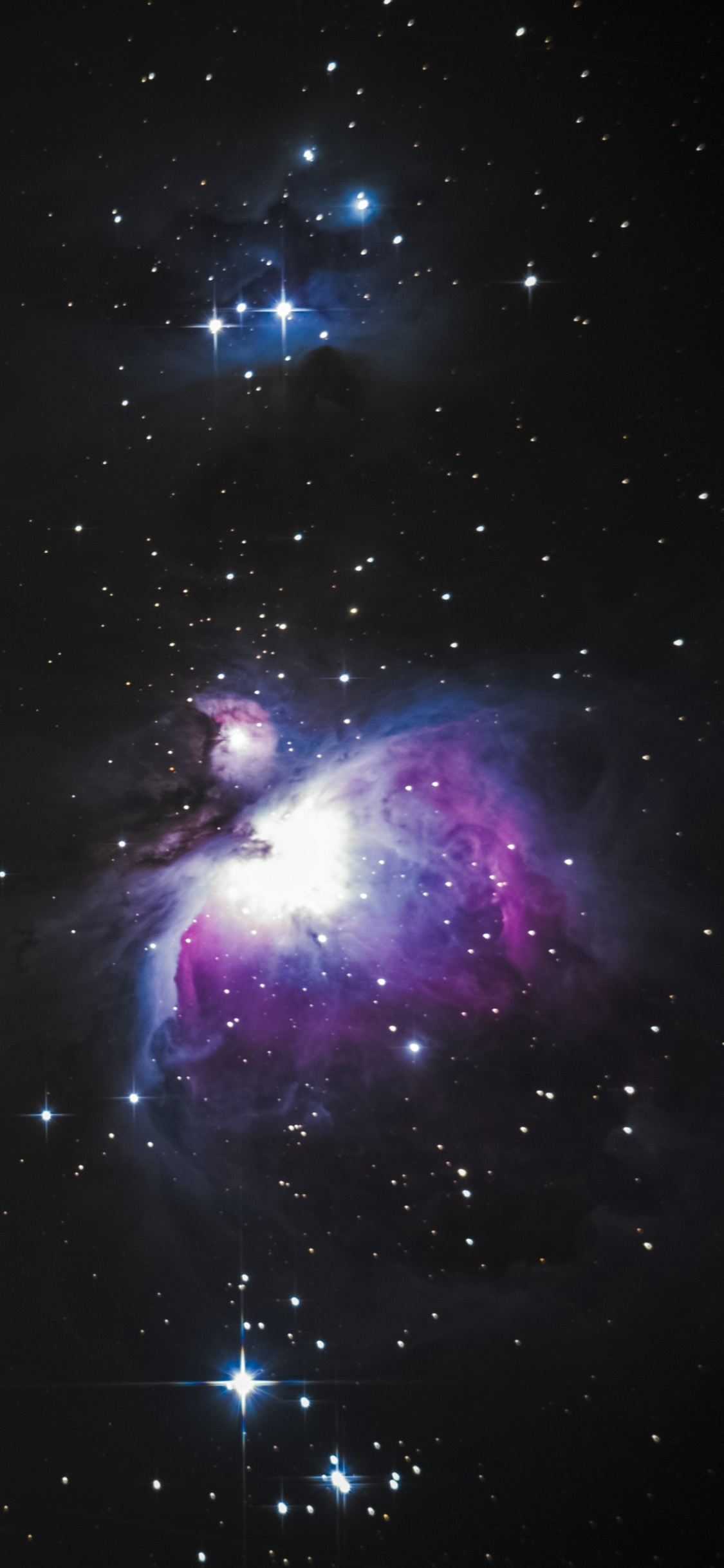 Galaxie Violette et Bleue Avec Des Étoiles. Wallpaper in 1125x2436 Resolution