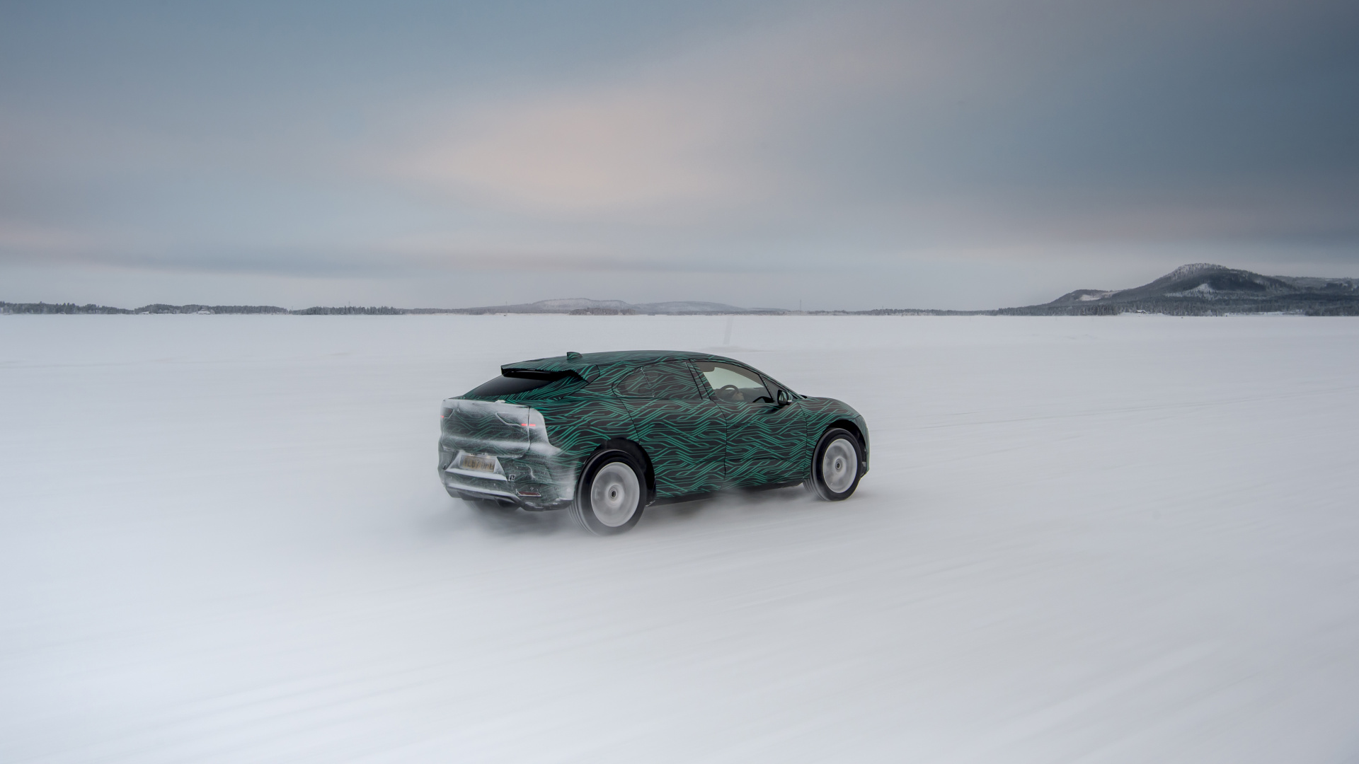 Green Car on Snow Covered Field. Wallpaper in 1920x1080 Resolution