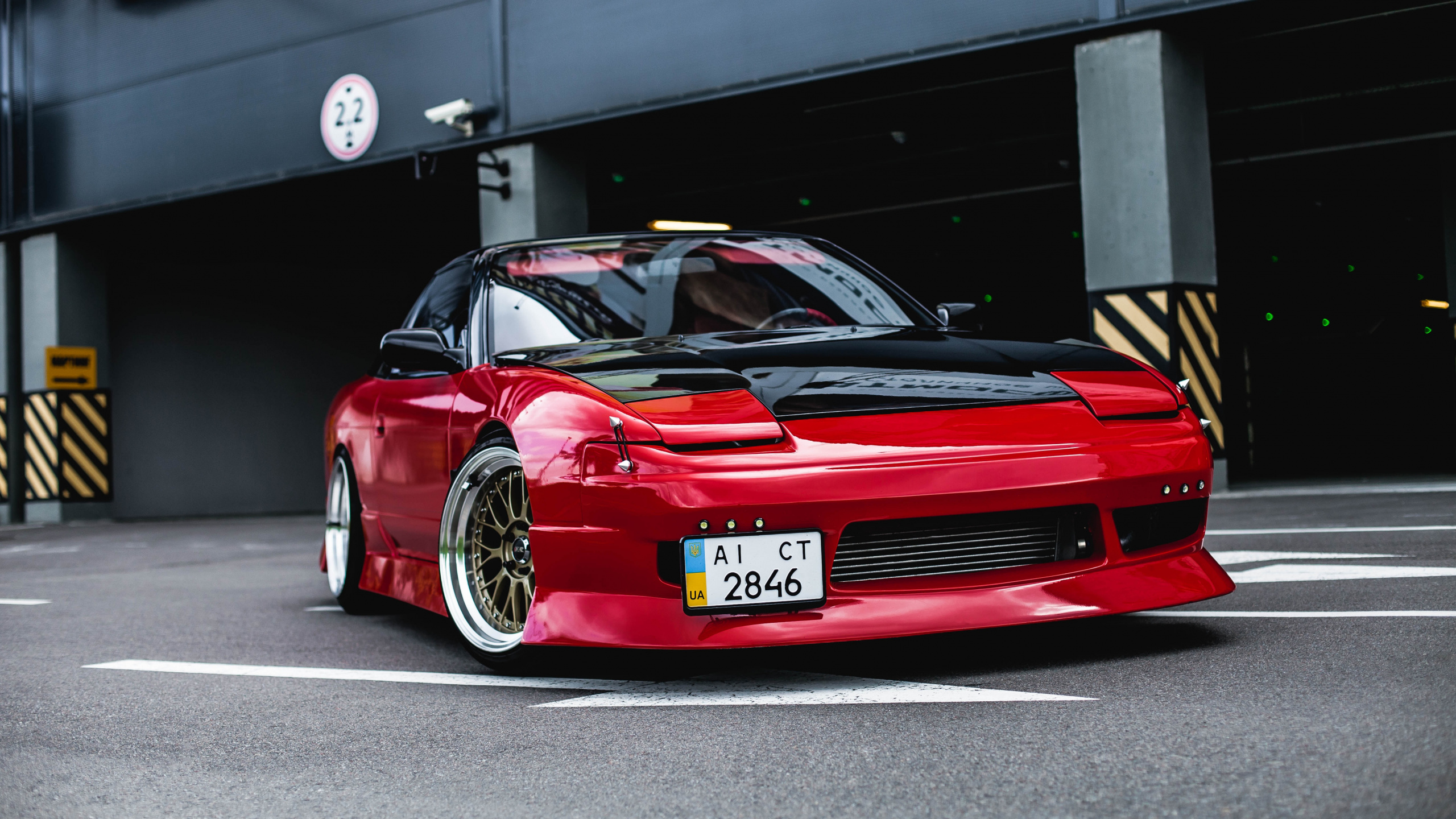 Red Porsche 911 Parked on Parking Lot. Wallpaper in 2560x1440 Resolution