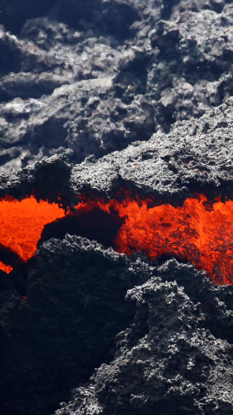 Black and Orange Rocky Shore. Wallpaper in 750x1334 Resolution